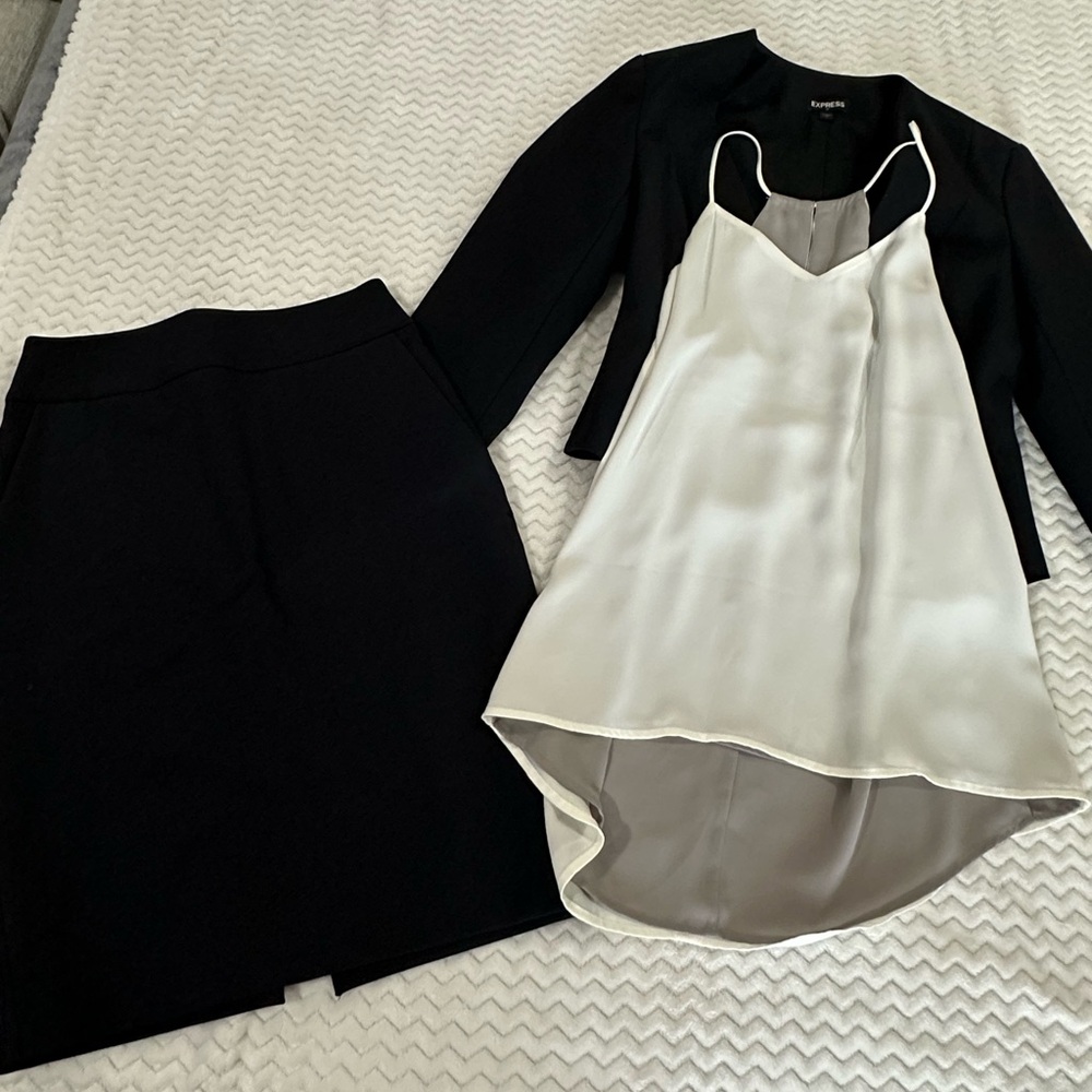 Size 2 jacket and size 4 skirt with matching reversible top from Express. Used